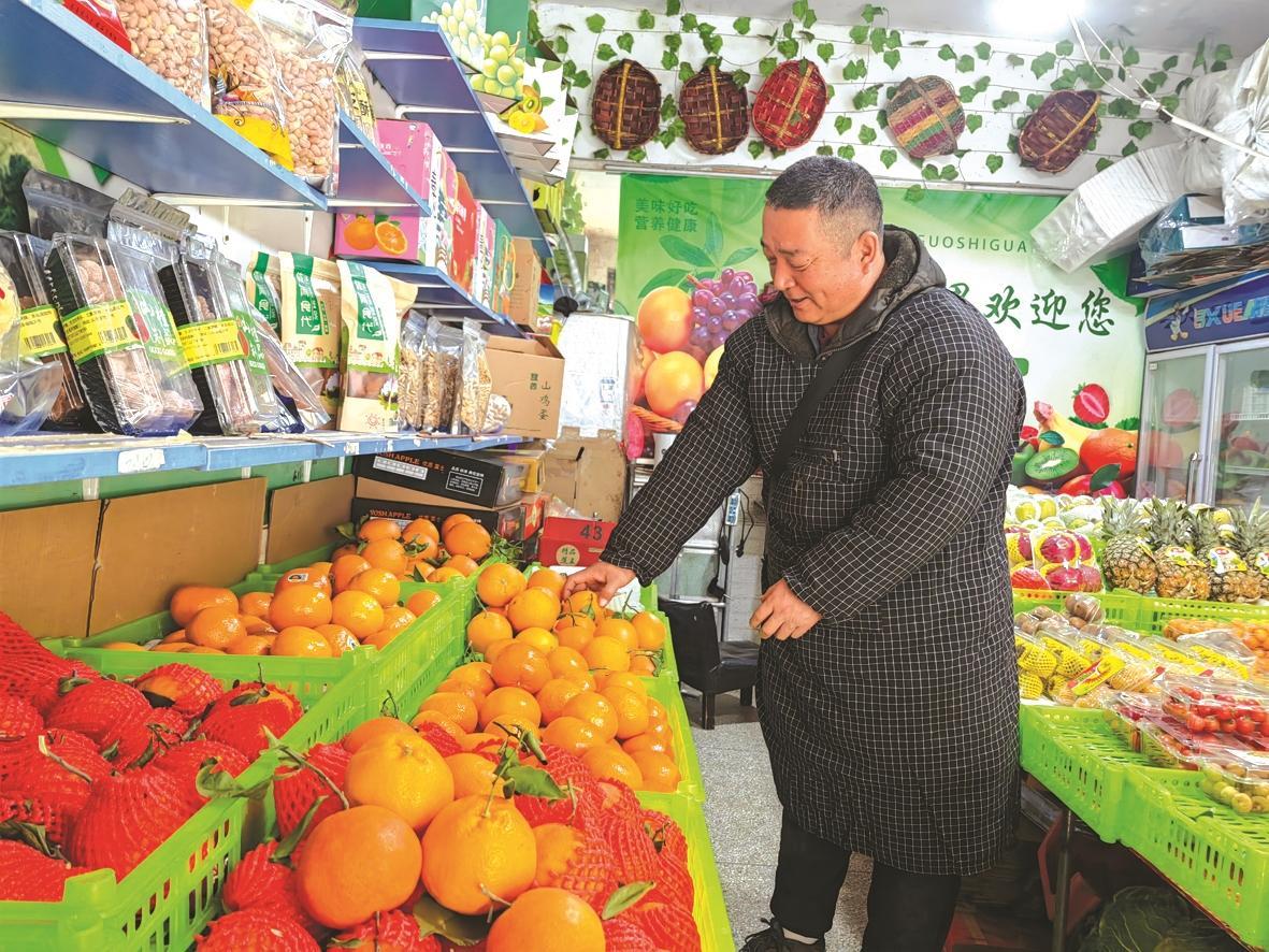 烟台向阳街水果店店主潘华平：无论多冷也不敢开空调取暖