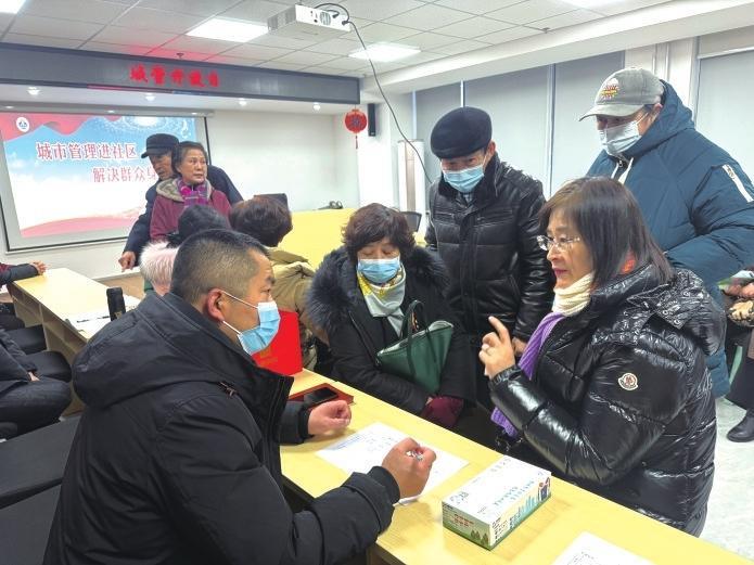 暖气不热 现场解决 烟台“城管进社区”为百姓解难题