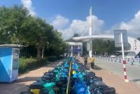 烟台市首批共享单车一次性防尘单车帽机正式投入使用