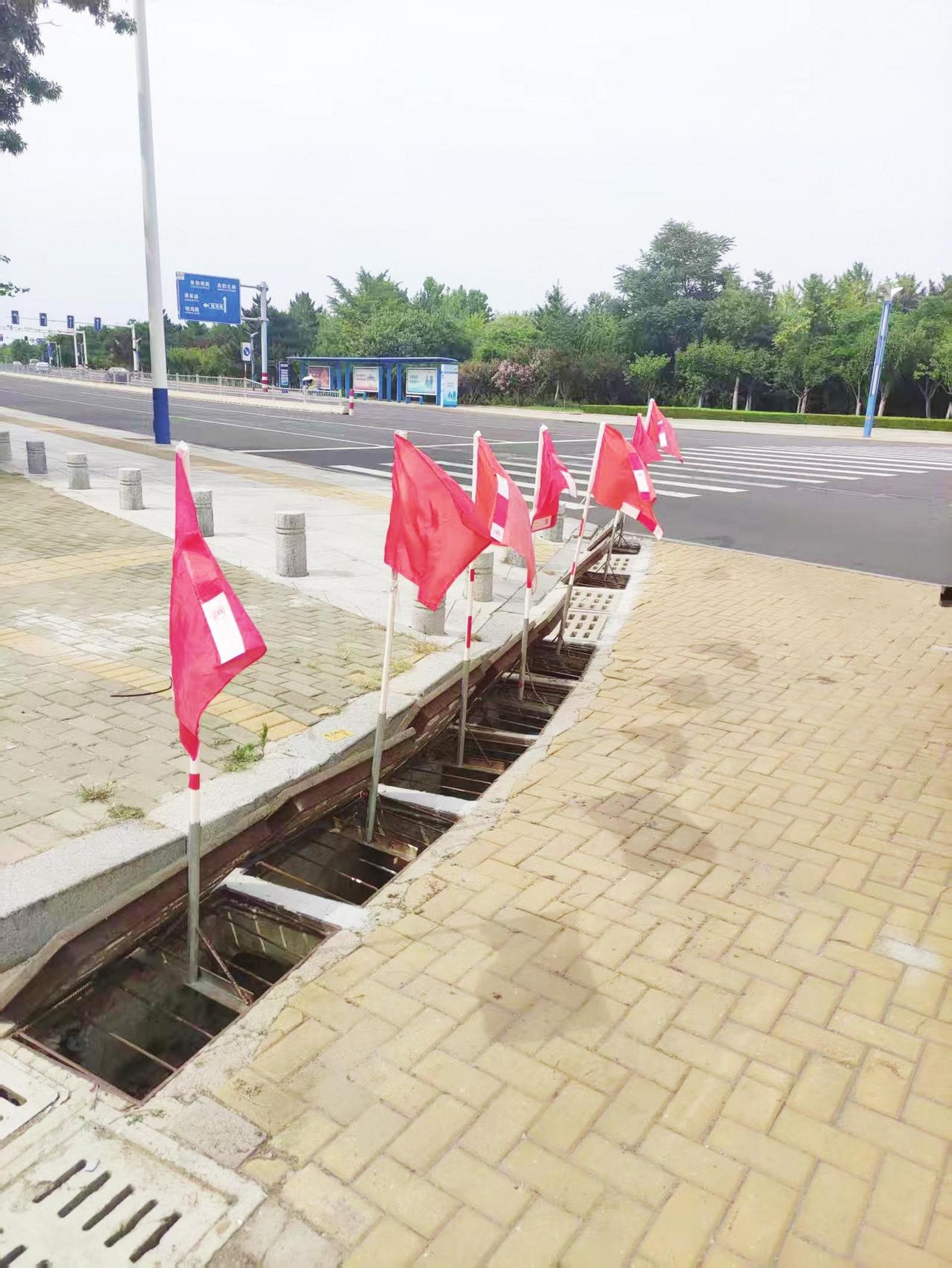 烟台筑牢安全防线应对“竹节草” 2400余个雨水箅子提前打开