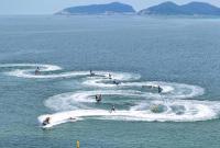 昨日，200多名运动员逐浪幸福湾畔！