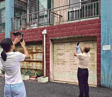 龙口市兴海名苑7栋楼外墙瓷砖脱落 督办员现场调查