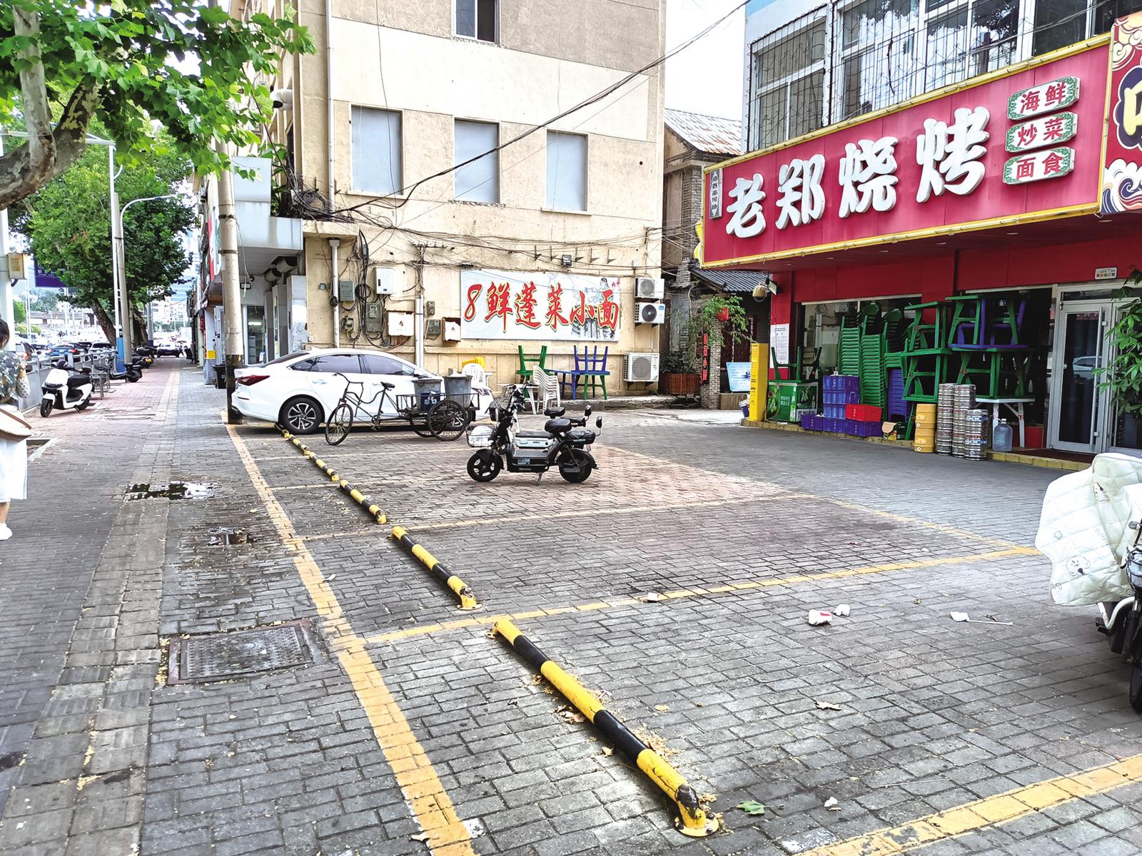 锐新停车场被占车位“归位”