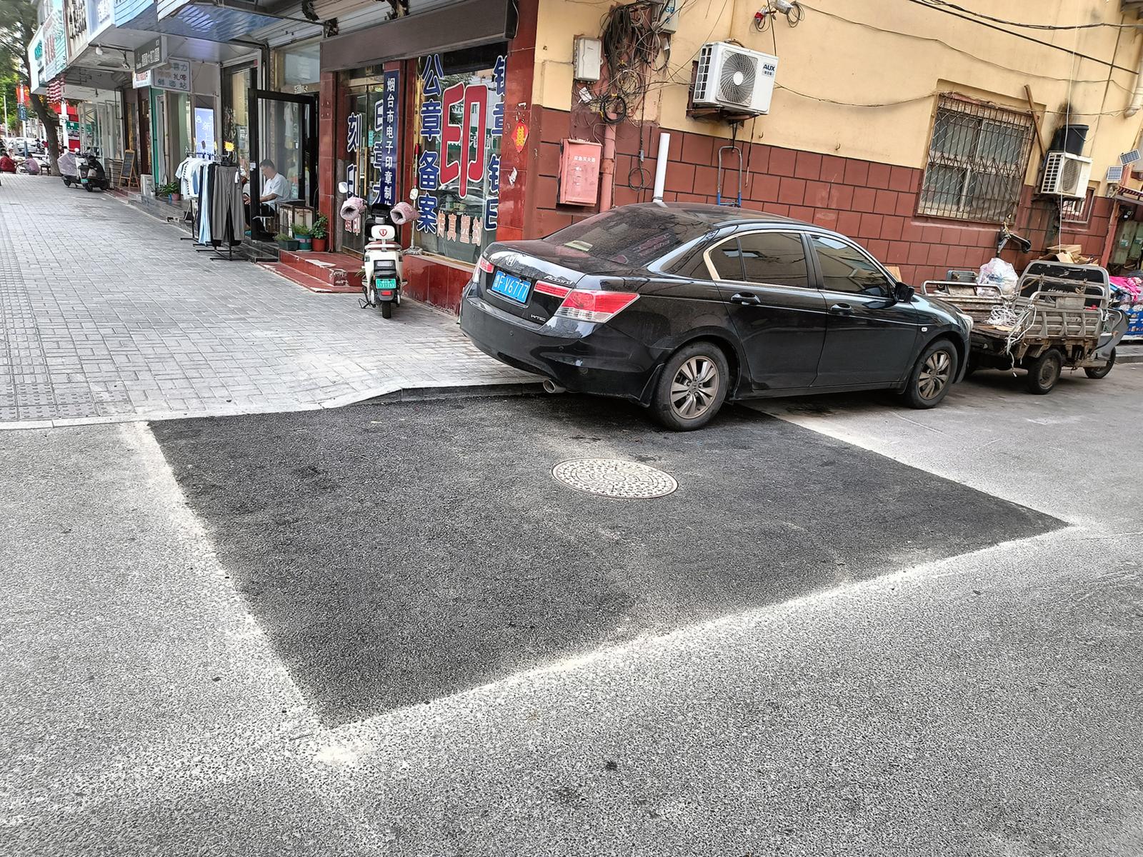 500挖开的两处路面硬化了 市民：不再扬尘和积水